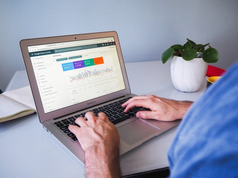 Reviewing Google Search Console SEO analytics on a laptop